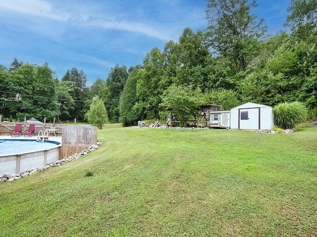 view of yard with a storage shed