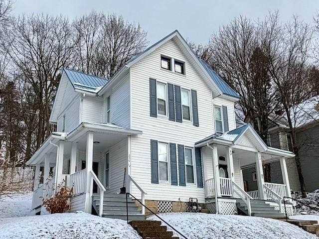 view of property with covered porch