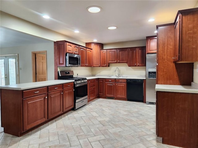 kitchen featuring appliances with stainless steel finishes and sink