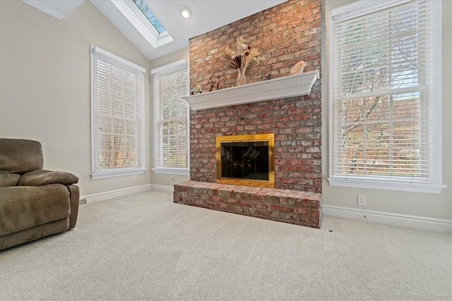 living room featuring carpet, a brick fireplace, and lofted ceiling