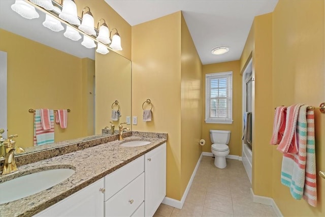 full bathroom with tile patterned floors, vanity, toilet, and shower / bath combination with glass door