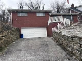 view of front of home featuring a garage