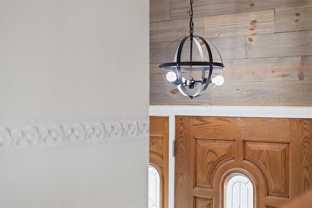 interior details with an inviting chandelier