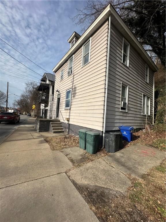 view of property exterior featuring cooling unit