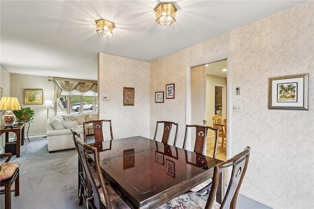 dining area with carpet