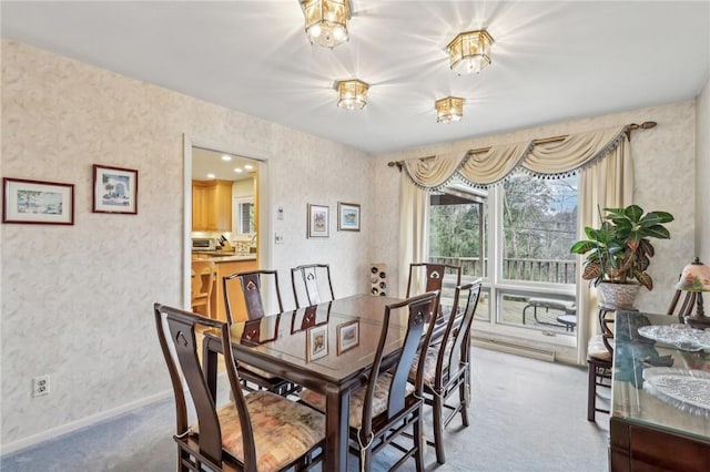 dining space with carpet