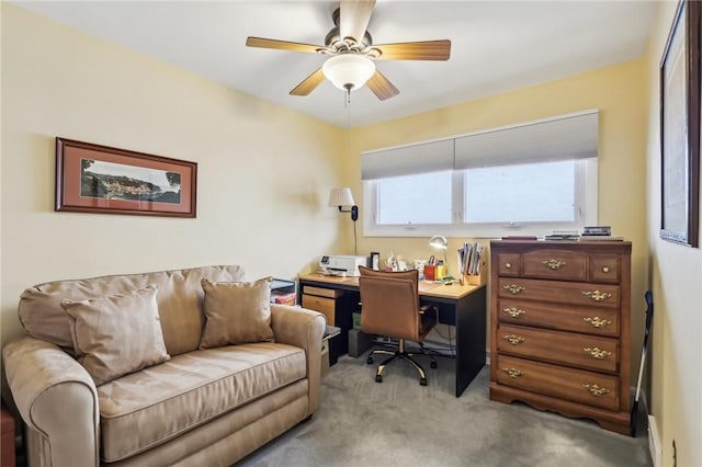 office area featuring ceiling fan and light colored carpet