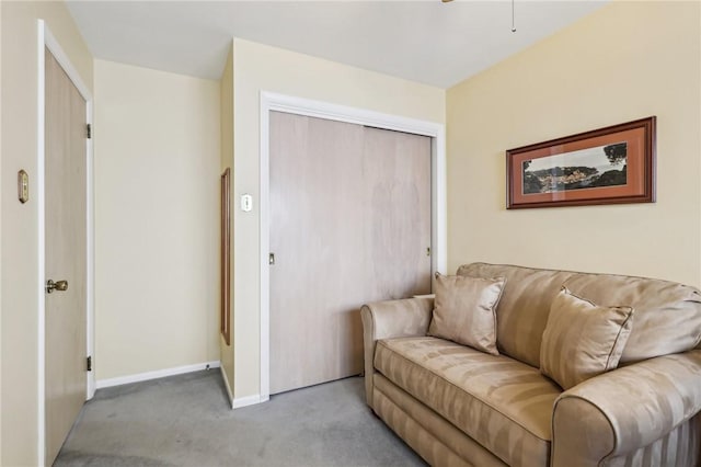 living room featuring light carpet