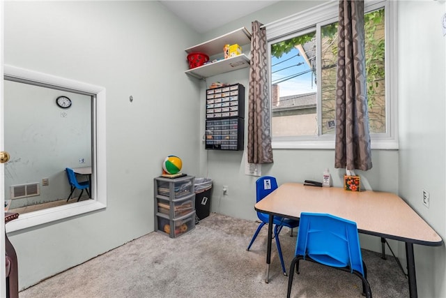 home office featuring light colored carpet