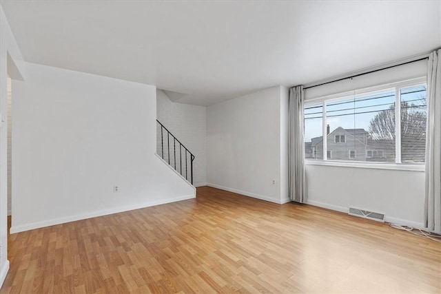 empty room featuring light wood-type flooring