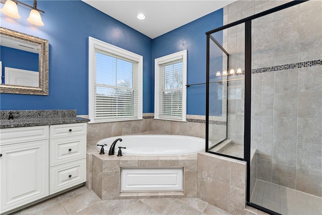 bathroom with vanity, separate shower and tub, and tile patterned flooring