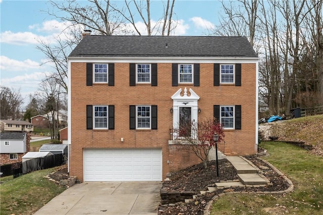 colonial-style house with a garage