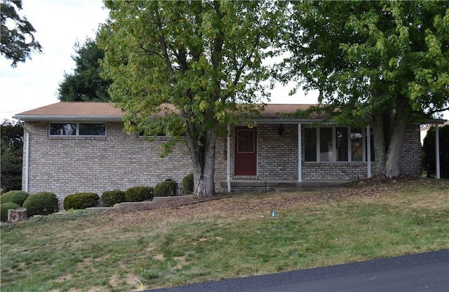 view of front of home with a front yard