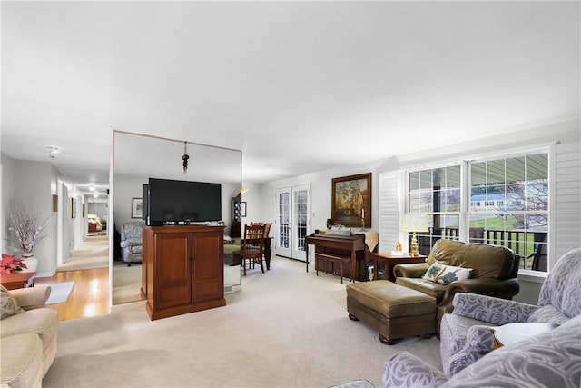 living room with light colored carpet