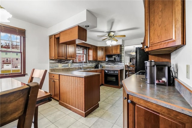 kitchen featuring ceiling fan, sink, backsplash, light tile patterned floors, and black appliances