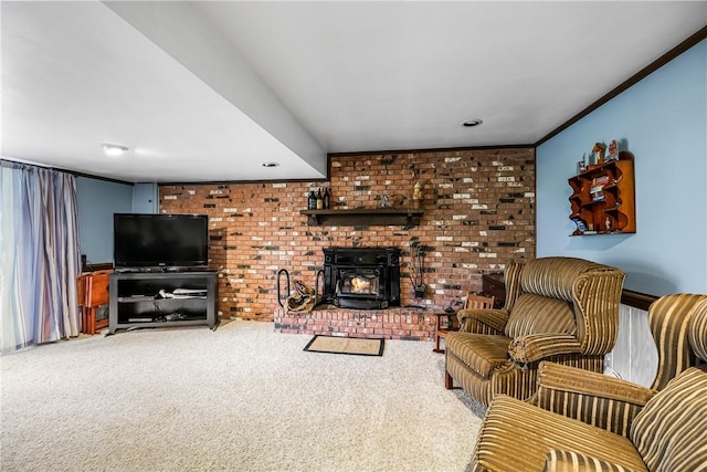 carpeted living room featuring a wood stove and ornamental molding