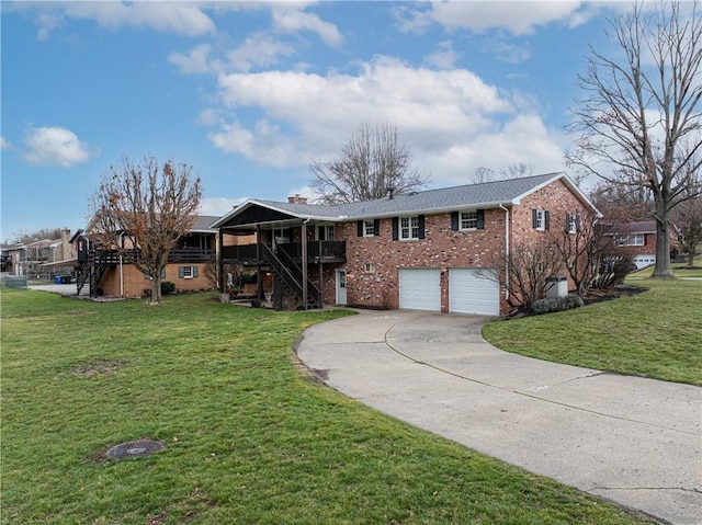 view of front of house featuring a front yard, a garage, and a wooden deck