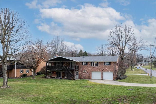 view of front of house featuring a wooden deck, a front lawn, and a garage