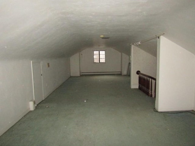 bonus room featuring lofted ceiling