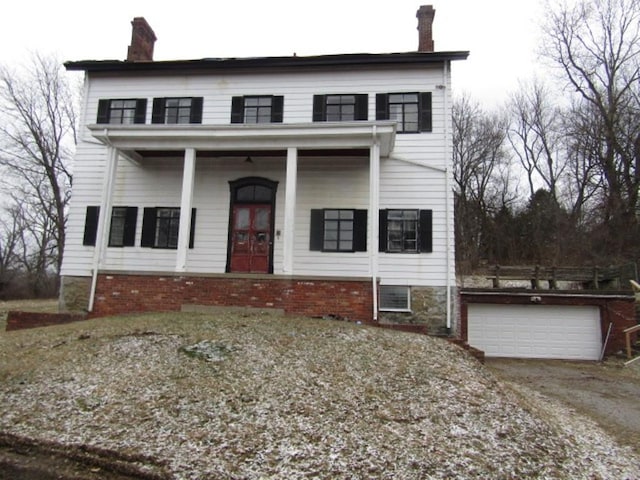 view of front of house featuring french doors and a garage