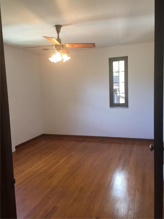 spare room featuring hardwood / wood-style flooring