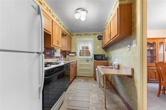 kitchen with white appliances and sink