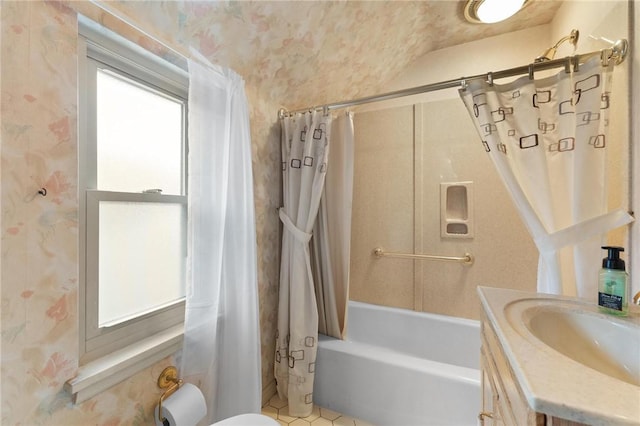 full bathroom with vanity, shower / bath combination with curtain, and toilet