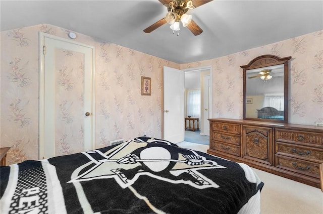 carpeted bedroom featuring ceiling fan