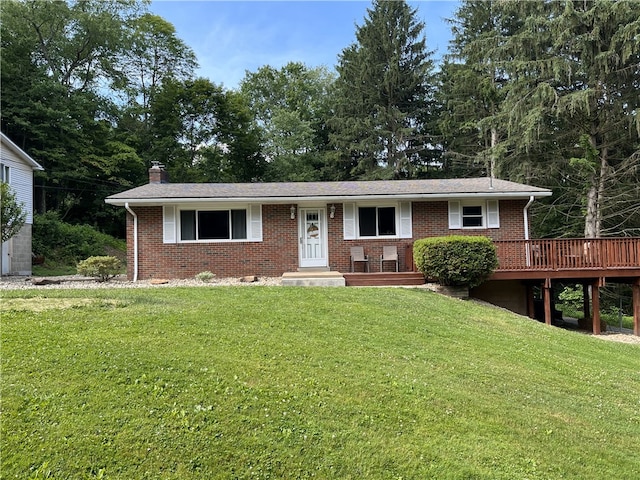 single story home featuring a front yard