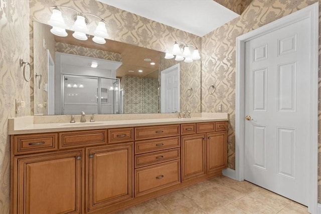 bathroom featuring vanity, tile patterned floors, and an enclosed shower