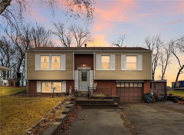 bi-level home featuring a garage