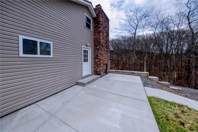 view of home's exterior with a patio