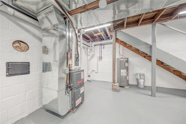 utility room with electric water heater