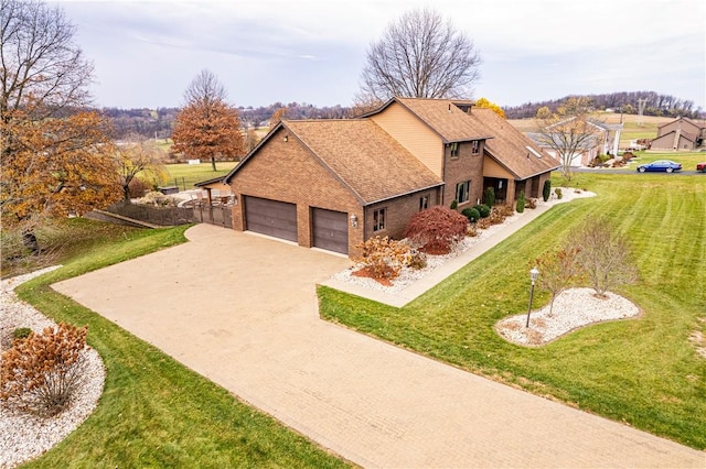 view of front facade featuring a front yard and a garage