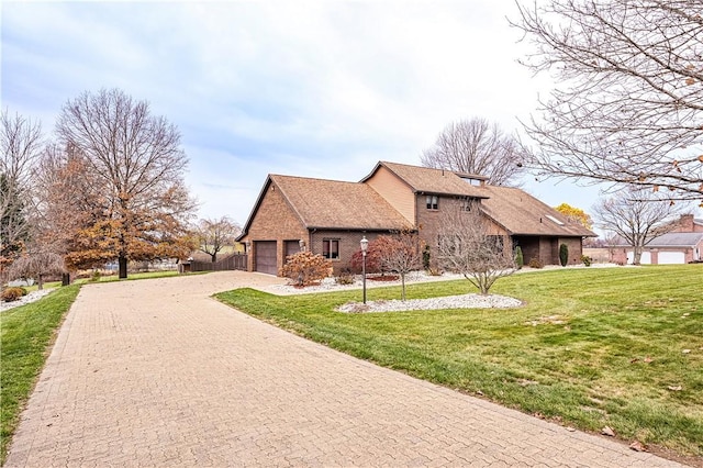 view of property exterior featuring a lawn and a garage