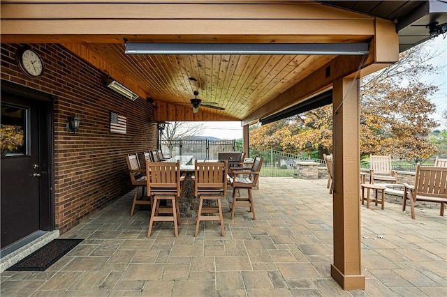 view of patio featuring ceiling fan