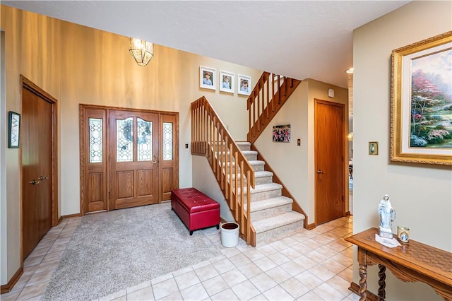 view of carpeted entrance foyer