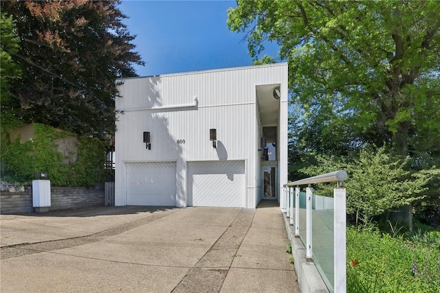 view of side of home with a garage