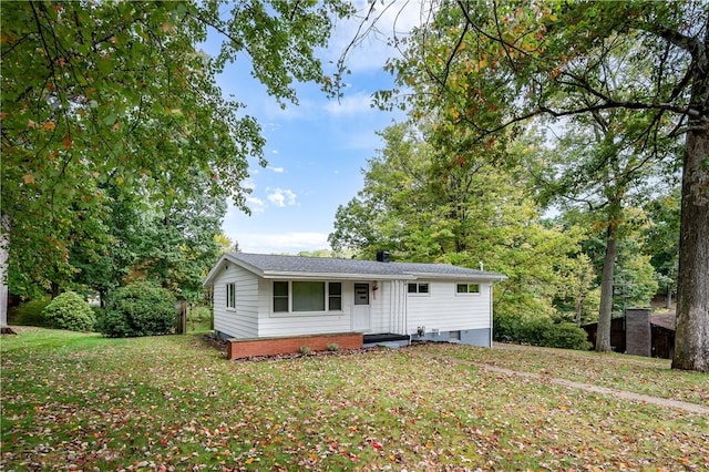 view of front of home with a front yard