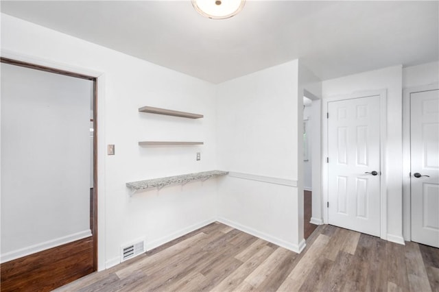 interior space with light hardwood / wood-style flooring