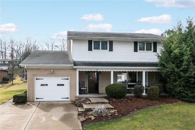 front facade featuring a porch and a garage