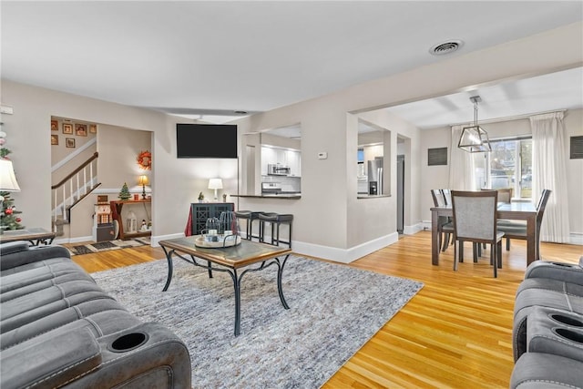 living room with wood-type flooring