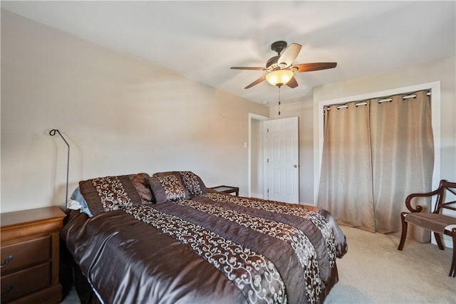 bedroom featuring ceiling fan and carpet floors