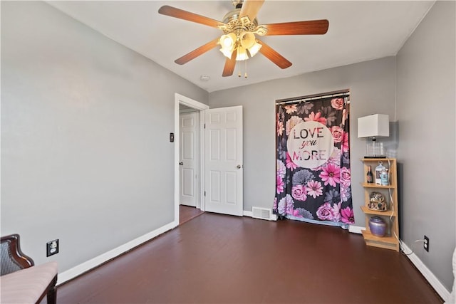 misc room with ceiling fan