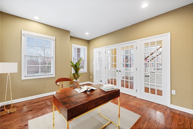 office space with french doors and wood-type flooring