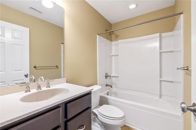 full bathroom featuring vanity, toilet, and tub / shower combination