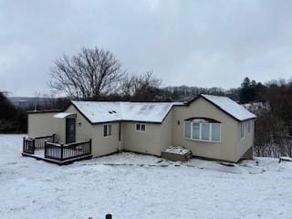 view of snow covered property