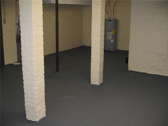 basement featuring electric water heater