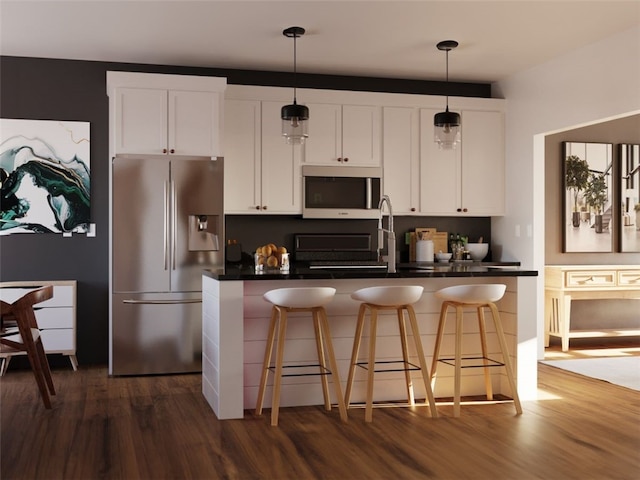 kitchen featuring a breakfast bar, white cabinetry, stainless steel refrigerator with ice dispenser, and hanging light fixtures