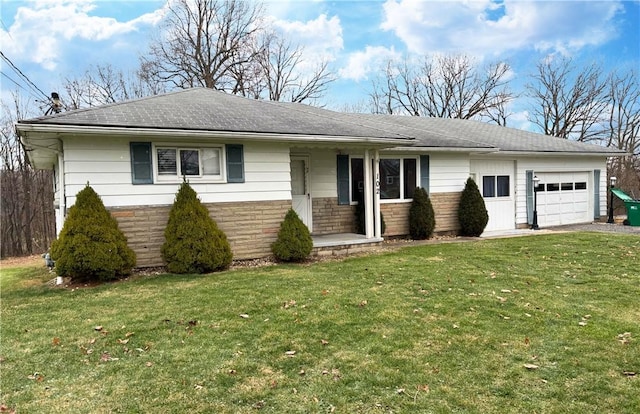 single story home with a garage and a front lawn